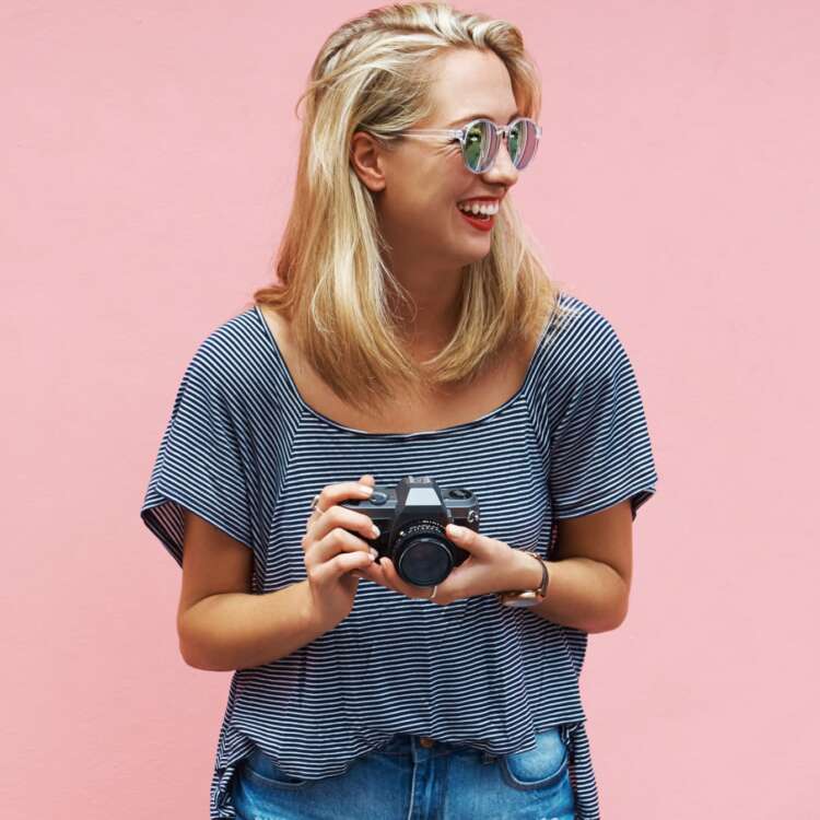 Woman with Camera - stock image