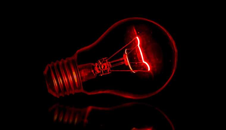 A light bulb lit magically without electricity.