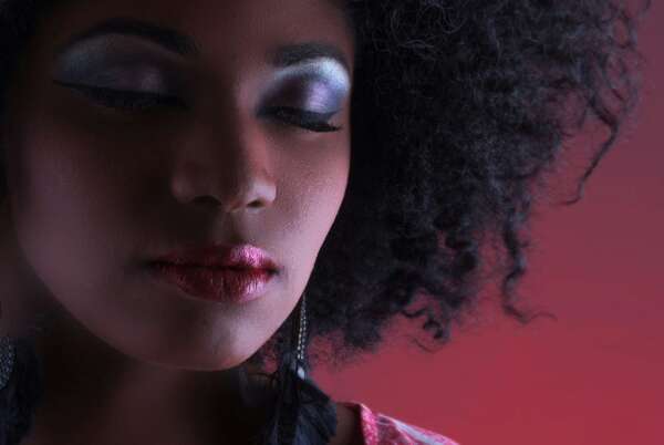 woman in red and white shirt