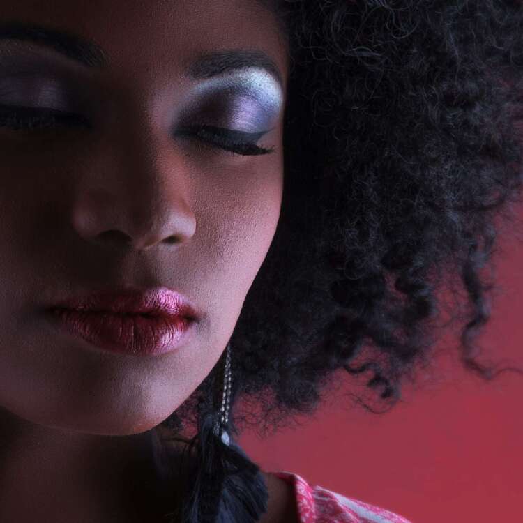 woman in red and white shirt